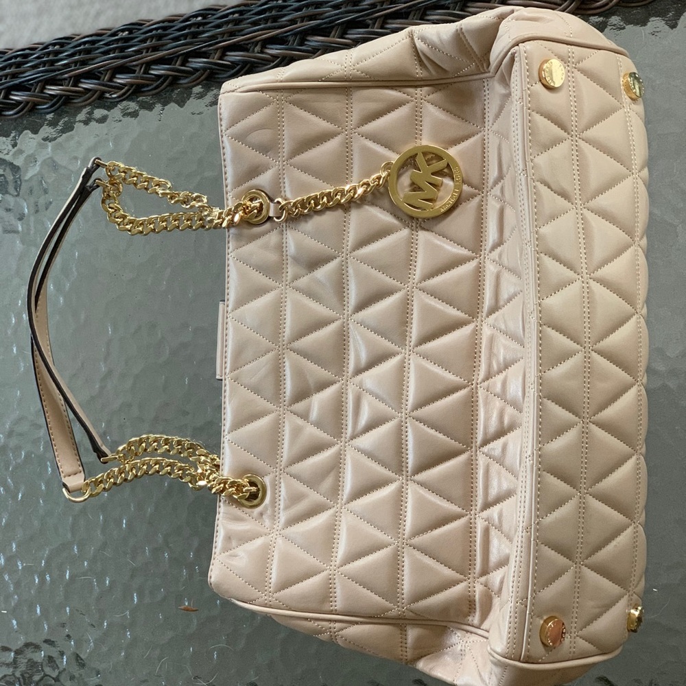 Michael Kors. REAL